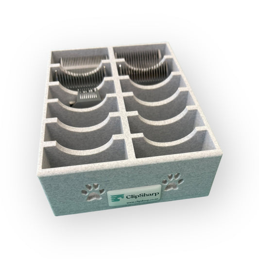 The Clip Sharp Standard Blade Tray is a gray 3D-printed organizer with eight curved slots for metal clipper blades, featuring the ClipSharp logo and two paw prints on the front.