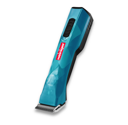 The Clipper Servicing is a blue cordless electric hair clipper with a black grip and red Heiniger logo on the front, designed for easy maintenance, displayed at an angle on a white background.