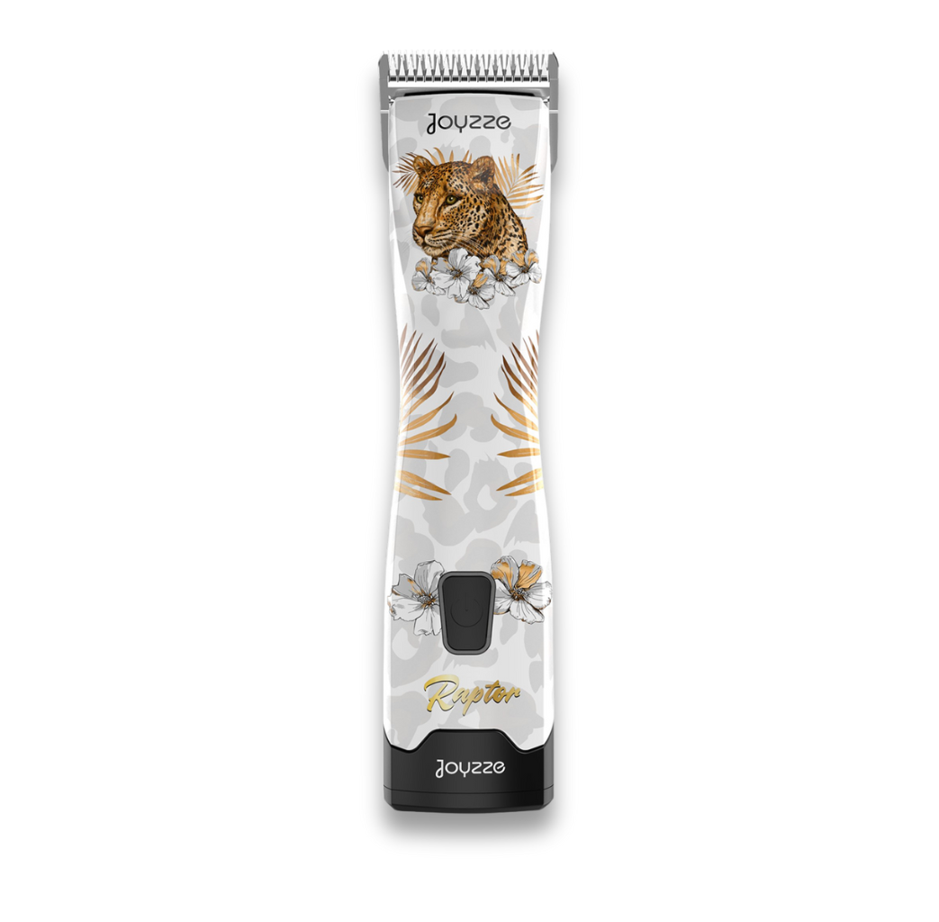 Clipper Servicing features a cordless hair clipper with a leopard design, gold accents, palm leaves, and white flowers on a pale patterned background—perfect for stylish users who appreciate easy clipper maintenance.